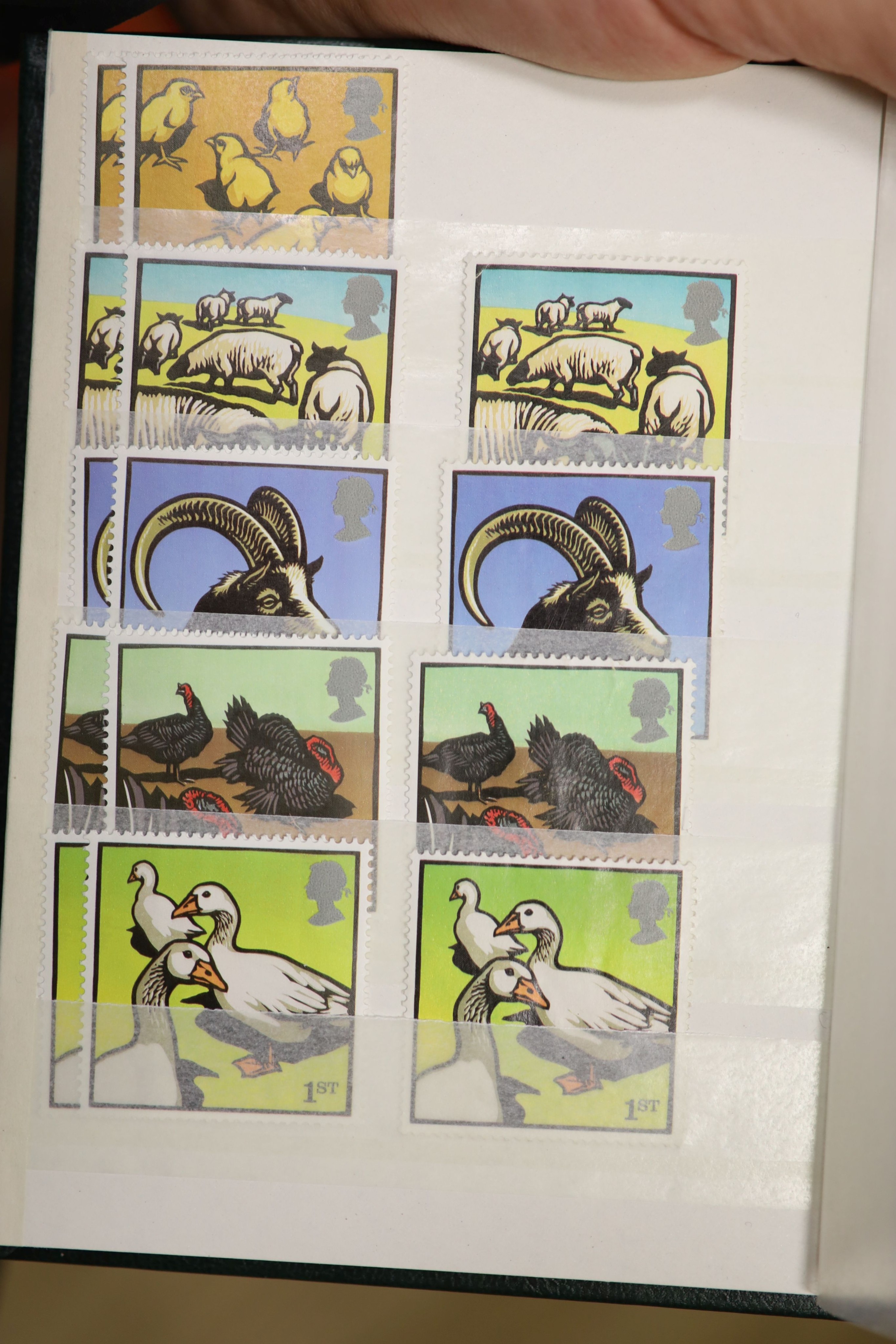 A large collection of Royal Mint first day covers, 1960's-2005, in albums and a large quantity of mint unused stamps in stockbooks for the years 1990s-2004 (2 boxes)